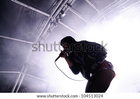 BARCELONA, SPAIN - JUNE 1: Silhouette of Alexis Krauss, singer of Sleigh Bells band, who performs at San Miguel Primavera Sound Festival on June 1, 2012 in Barcelona, Spain.