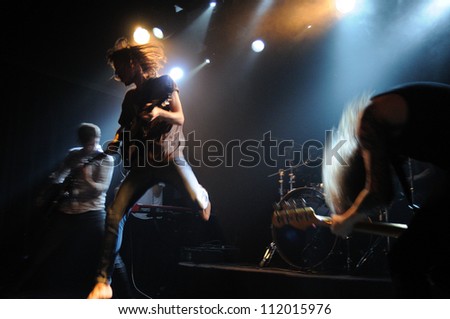 BARCELONA, SPAIN - SEPT 4: Peter Liddle, frontman of Dry the River band, jumps with his electric guitar at Music Hall on September 4, 2012 in Barcelona, Spain. Budweiser Live Circuit.