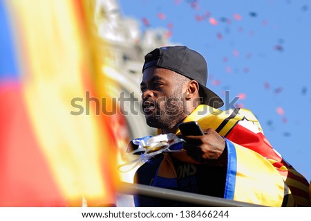 BARCELONA - MAY 13: Alexandre Dimitri Song Billong, from Cameroon, player of F.C Barcelona football team, celebrates the title consecution of Spanish League on May 13, 2013 in Barcelona, Spain.