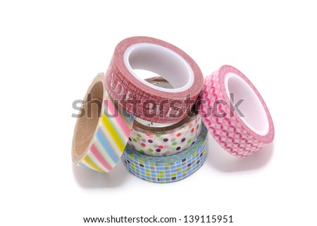 Rolls of Washi Tape isolated on white background. Is a decorative handmade paper with a traditional Chinese method that was introduced in Japan by a Korean Buddhist priest.
