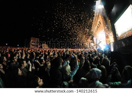 Barcelona - May 23: People Watching A Concert, While Throwing Confetti From The Stage At Heineken Primavera Sound 2013 Festival, Pitchfork Stage, On May 23, 2013 In Barcelona, Spain.