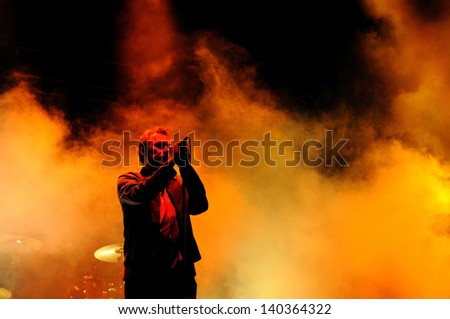 BARCELONA - MAY 24: Jim Reid, lead singer for the alternative rock band The Jesus and Mary Chain, performs at Heineken Primavera Sound 2013 Festival on May 24, 2013 in Barcelona, Spain.