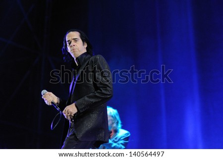 BARCELONA - MAY 25: Nick Cave and the Bad Seeds band, performs at Heineken Primavera Sound 2013 Festival on May 25, 2013 in Barcelona, Spain.