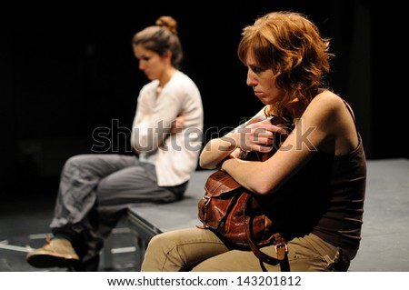 BARCELONA - JAN 13: Angry and sad actresses of the Barcelona Theater Institute, play in the comedy Shakespeare For Executives on January 13, 2013 in Barcelona, Spain.