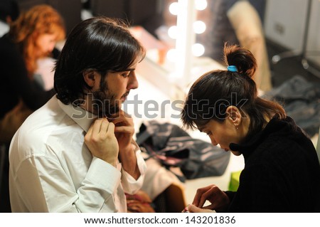 BARCELONA - JAN 13: An actor Theater Institute, dresses and prepares to go on stage in the comedy Shakespeare For Executives on January 13, 2013 in Barcelona, Spain.