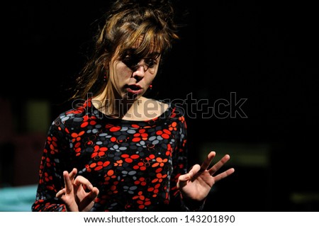 BARCELONA - JAN 13: An actress of the Barcelona Theater Institute, plays in the comedy Shakespeare For Executives on January 13, 2013 in Barcelona, Spain.