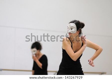 BARCELONA - MAR 3: Actors with masks play Commedia dell\'arte on March 3, 2011 in Barcelona, Spain. Is a form of theater characterized by masked types which began in Italy.