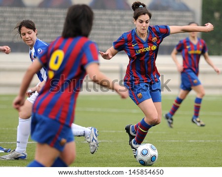 BARCELONA - APR 18: F.C Barcelona women\'s football team play against RCD Espanyol on April 18, 2010 in Barcelona, Spain. Superliga (Women\'s Football Spanish League) match.