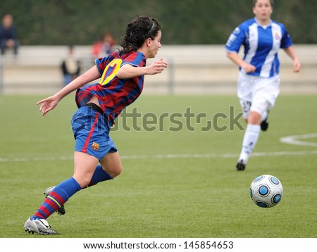 BARCELONA - APR 18: F.C Barcelona women\'s football team play against RCD Espanyol on April 18, 2010 in Barcelona, Spain. Superliga (Women\'s Football Spanish League) match.
