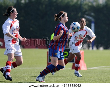 BARCELONA - MAR 14: F.C Barcelona women\'s football team play against Rayo Vallecano on March 14, 2010 in Barcelona, Spain. Superliga (Women\'s Football Spanish League) match.