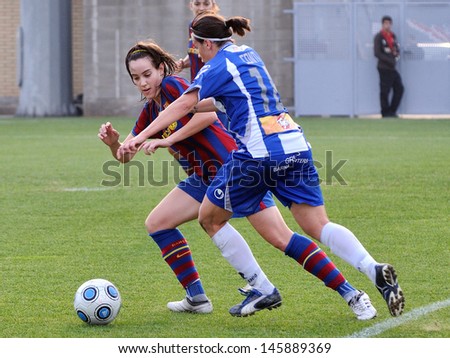 BARCELONA - OCT 31: F.C Barcelona women\'s football team play against RCDE Espanyol on October 31, 2009 in Barcelona, Spain. Superliga (Women\'s Football Spanish League) match.