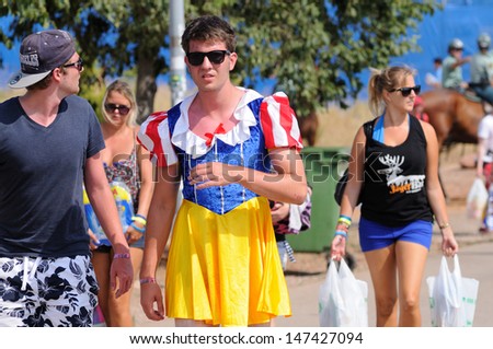 BENICASIM, SPAIN - JULY 18: A boy dressed as Snow White (Disney character) at FIB (Festival Internacional de Benicassim) 2013 Festival on July 18, 2013 in Benicasim, Spain.