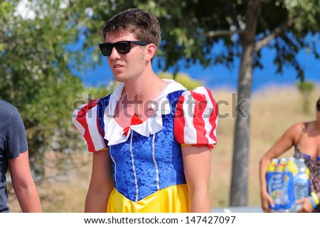 BENICASIM, SPAIN - JULY 18: A boy dressed as Snow White (Disney character) at FIB (Festival Internacional de Benicassim) 2013 Festival on July 18, 2013 in Benicasim, Spain.