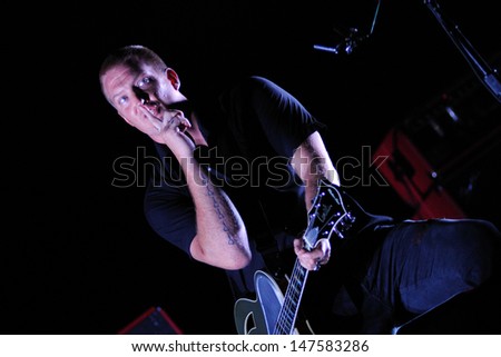 BENICASIM, SPAIN - JULY 18: Josh Homme, singer of Queens of the Stone Age (band), tell to shut up at FIB (Festival Internacional de Benicassim) 2013 Festival on July 18, 2013 in Benicasim, Spain.