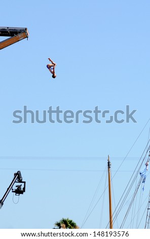 BARCELONA - JULY 30: Tara Hyer Tira, jumps from the High Diving Tower at the final of women\'s high altitude jumps at Barcelona Swimming World Championship on July 30, 2013 in Barcelona, Spain.