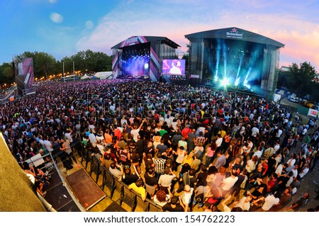 MADRID SEPT 14 Audience at Dcode Festival during a concert on September 14 2013 in Madrid Spain MADRID SEPT 14 Audience at Dcode Festival during a concert on September 14 2013 in Madrid Spain