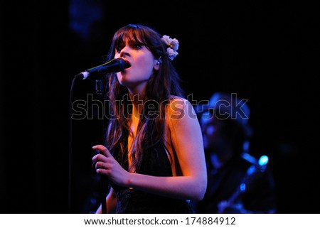 BARCELONA - APR 25: Zooey Deschanel, Hollywood Actress and singer, performs with her band She & Him at Apolo on April 25, 2010 in Barcelona, Spain. She perfoms with M. Ward.