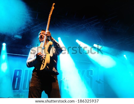 BENICASSIM, SPAIN - JULY 14: Buzzcocks (English punk rock band) performs at FIB on July 14, 2012 in Benicassim, Spain. Festival Internacional de Benicassim.