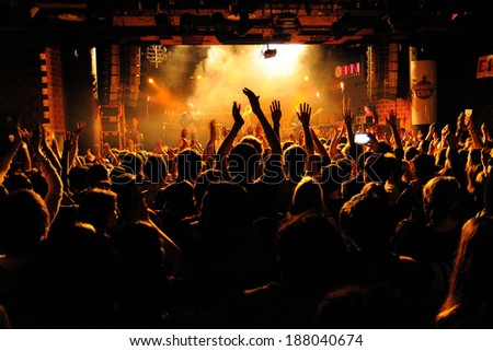BARCELONA, SPAIN - FEB 21: People from the crowd (fans) applauding a concert by Bombay Bicycle Club (band) at Bikini Club on February 21, 2014 in Barcelona, Spain.