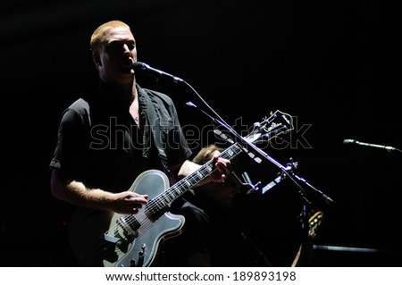 BENICASIM, SPAIN - JULY 18: Queens of the Stone Age (American rock band from Palm Desert, California) concert at FIB 2013 Festival on July 18, 2013 in Benicasim, Spain.