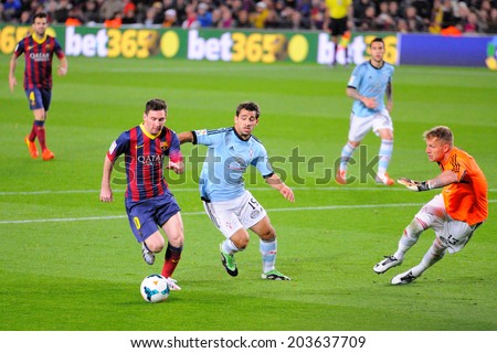 BARCELONA - MAR 26: Leo Messi (left), Argentinean F.C Barcelona player, about to score a goal against Celta de Vigo at the Camp Nou on the Spanish League on March 26, 2014 in Barcelona, Spain.