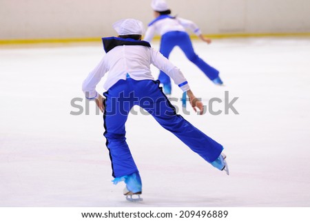 BARCELONA - MAY 03: Young team from a school of skating on ice performs, disguised as sailors, at the International Cup Ciutat de Barcelona Open on May 3, 2014 in Barcelona, Spain.
