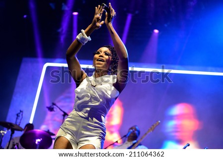 BARCELONA - JUN 14: Woman dancer of Chic featuring Nile Rodgers (band) performs at Sonar Festival on June 14, 2014 in Barcelona, Spain.