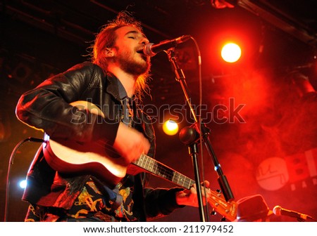 BARCELONA, SPAIN - MAR 21: Carlos Sadness, better known as Shinoflow (Spanish singer, composer and illustrator) sings at Bikini Club on March 21, 2014 in Barcelona, Spain.