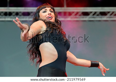 BARCELONA - MAY 23: Woman dances the belly dance at the Primavera Pop Festival of Badalona on May 18, 2014 in Barcelona, Spain.