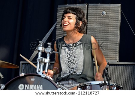 BENICASSIM, SPAIN - JULY 18: Drummer and singer of El Pardo (band) performs with a Joy Division shirt at FIB Festival on July 18, 2014 in Benicassim, Spain.