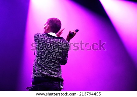 BARCELONA - MAY 28: Stromae, Belgian singer who plays House, New Beat and electronic music, performs at Heineken Primavera Sound 2014 Festival (PS14) on May 28, 2014 in Barcelona, Spain.