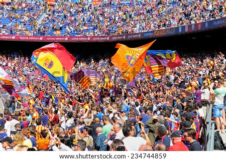 BARCELONA - MAY 03: Supporters of F.C. Barcelona football team at the Camp Nou Stadium on May 3, 2014 in Barcelona, Spain.