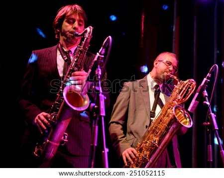 BARCELONA - JAN 9: Saxophone players of The Limboos (rhythm and blues band) performs at Apolo venue on January 9, 2015 in Barcelona, Spain.