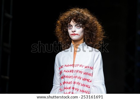 BARCELONA - FEB 2: A model walks the runway disguised as the Joker for the Brain and Beast collection at the 080 Barcelona Fashion Week 2015 Fall Winter on February 2, 2015 in Barcelona, Spain.