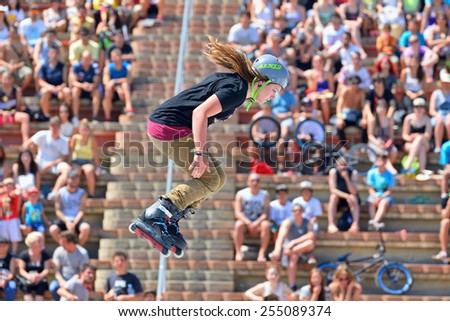 BARCELONA - JUN 28: A professional skater at the Inline skating jumps competition at LKXA Extreme Sports Barcelona Games on June 28, 2014 in Barcelona, Spain.