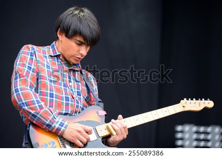 BARCELONA - MAY 28: Guitar electric player of El Mato a un Policia Morotizado (band from Argentina), performs at Heineken Primavera Sound 2014 Festival (PS14) on May 28, 2014 in Barcelona, Spain.