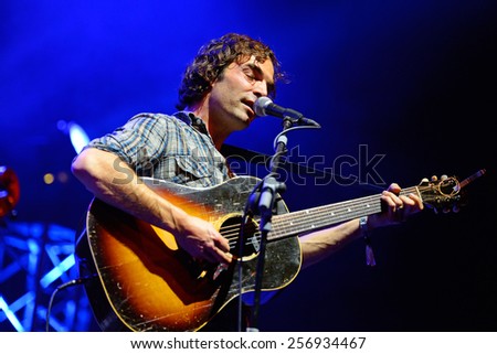 BILBAO, SPAIN - OCT 31: Acoustic guitar player of The Barr Brothers (band) live performance at Bime Festival on October 31, 2014 in Bilbao, Spain.