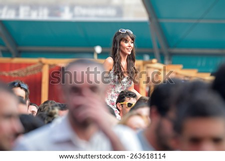 BARCELONA - JUN 12: A woman from the crowd at Sonar Festival on June 12, 2014 in Barcelona, Spain.