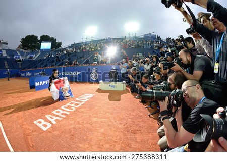 BARCELONA - APR 26: Photographers take pictures of Kei NishIkori, winner of the tournament, at the ATP Barcelona Open Banc Sabadell Conde de Godo tournament on April 26, 2015 in Barcelona, Spain.