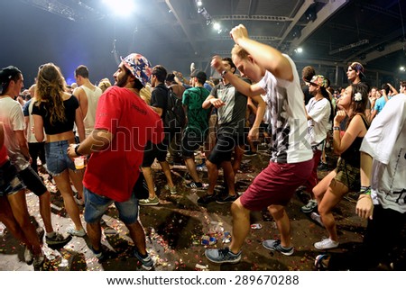 BARCELONA - JUN 19: People dance in an electronic concert at Sonar Festival on June 19, 2015 in Barcelona, Spain.