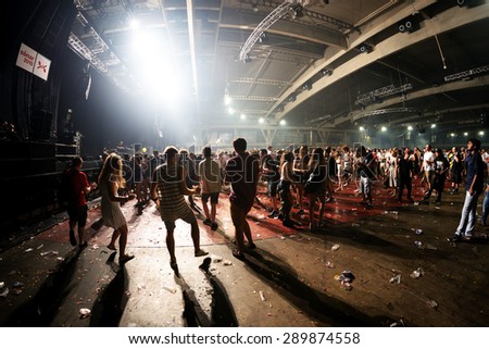 BARCELONA - JUN 19: People dance in an electronic concert at Sonar Festival on June 19, 2015 in Barcelona, Spain.
