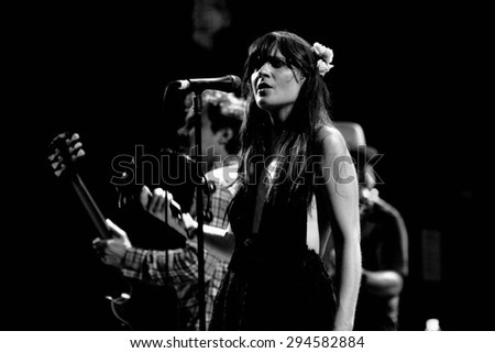 BARCELONA - APR 25: Zooey Deschanel, Hollywood Actress and singer, performs with her band She & Him at Apolo on April 25, 2010 in Barcelona, Spain.