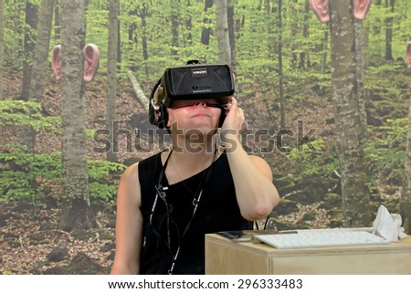 BARCELONA - JUN 20: People with virtual reality glasses at Sonar Festival on June 20, 2015 in Barcelona, Spain.
