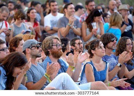 BARCELONA - JUL 3: People from the audience watch a concert at Vida Festival on July 3, 2015 in Barcelona, Spain.