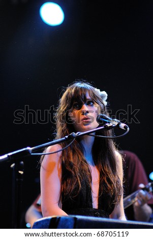 BARCELONA, SPAIN - APR 25: Zooey Deschanel, Hollywood Actress and singer, performs with her band She & Him at Apolo on April 25, 2010 in Barcelona, Spain. She perfoms with Matt Ward.