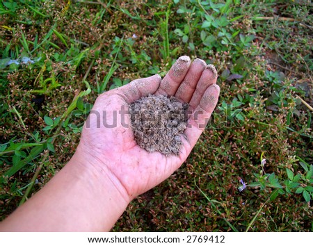 hand scooped dry dirt