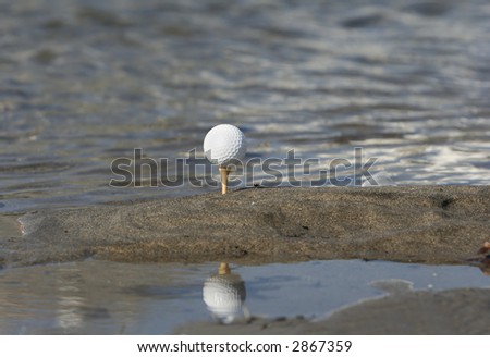 golf ball with reflex in the water