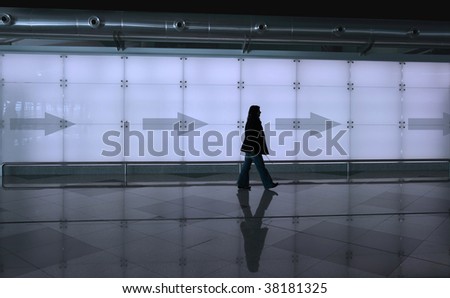 girl walking with reflection on the floor