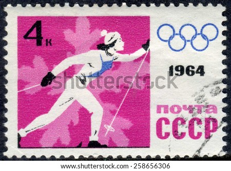 RUSSIA - CIRCA 1964: stamp printed by Russia, shows sport, skier, skiing, snowflake, winter circa 1964