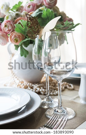 Restaurant table witch empty glasses and plates